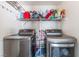 Laundry room featuring stainless steel washer and dryer at 2410 Morocco Ave, North Las Vegas, NV 89031