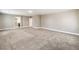 Large bonus room with neutral carpet and lots of natural light at 260 Pioneers Peak, Henderson, NV 89002