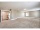 Bonus room featuring neutral carpet and plenty of natural light at 260 Pioneers Peak, Henderson, NV 89002