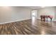 Open concept living area featuring hardwood floors, recessed lighting, and neutral paint at 260 Pioneers Peak, Henderson, NV 89002