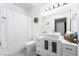 Bright bathroom featuring a modern vanity, stylish sink, and a white shower curtain at 2615 W Gary Ave # 1089, Las Vegas, NV 89123