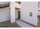 The unit entrance features a walkway, a large door, and an outdoor fire extinguisher at 2615 W Gary Ave # 1089, Las Vegas, NV 89123