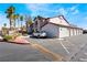 Exterior shot with garages and parking showcasing the building's practical design at 2615 W Gary Ave # 1089, Las Vegas, NV 89123