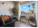 Cozy outdoor patio area with seating, decor, and views of the neighborhood at 2615 W Gary Ave # 1089, Las Vegas, NV 89123