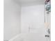 Clean shower showcasing white tile and a convenient built-in shelf at 2615 W Gary Ave # 1089, Las Vegas, NV 89123