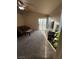 Spacious living room featuring carpeted floors, a sliding glass door to the back, and comfortable seating at 2883 Mount Hope Dr, Las Vegas, NV 89156