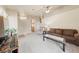 Bright living room with vaulted ceilings, carpet, and a comfortable seating area at 2883 Mount Hope Dr, Las Vegas, NV 89156