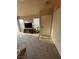 Sunlit living room with carpet floors, and a front door at 2883 Mount Hope Dr, Las Vegas, NV 89156