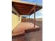 Backyard featuring a covered patio, rock landscaping, perimeter wall and mountain views at 2883 Mount Hope Dr, Las Vegas, NV 89156