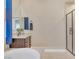 Elegant bathroom with a soaking tub, glass-enclosed shower, and granite-topped vanity at 2931 Raywood Ash Dr, Las Vegas, NV 89138