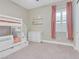 Cozy ' bedroom with a bunk bed, ample storage, and natural light at 2931 Raywood Ash Dr, Las Vegas, NV 89138