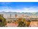 Expansive city view showcasing the skyline and mountains from this stunning community at 2931 Raywood Ash Dr, Las Vegas, NV 89138