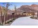 Scenic community park pathway with benches and lush landscaping against a mountainous backdrop at 2931 Raywood Ash Dr, Las Vegas, NV 89138