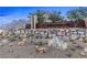 Stone wall and monument sign at the entrance to Reverence at Summerlin with mountain views at 2931 Raywood Ash Dr, Las Vegas, NV 89138