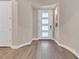 Bright foyer with modern flooring, a stylish front door, and neutral wall tones at 2931 Raywood Ash Dr, Las Vegas, NV 89138