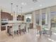 Stunning kitchen features a large center island, pendant lighting and stainless steel appliances at 2931 Raywood Ash Dr, Las Vegas, NV 89138
