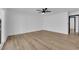 Spacious bedroom with wood-style floors and a ceiling fan at 3228 Robin Cir, Las Vegas, NV 89121
