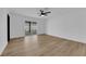 Bedroom featuring wood-look flooring, a sliding glass door with backyard view at 3228 Robin Cir, Las Vegas, NV 89121