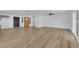 Bright living room boasts light wood flooring and a modern orange front door, providing a welcoming and stylish space at 3228 Robin Cir, Las Vegas, NV 89121