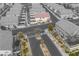 Aerial view of the community showcasing the landscaping and surrounding grey two-story homes at 3405 Robust Robin Pl # 3, North Las Vegas, NV 89084