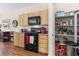 Well-equipped kitchen with modern appliances, wood cabinets and an abundance of storage at 3405 Robust Robin Pl # 3, North Las Vegas, NV 89084