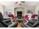 Comfortable living area featuring modern decor, wood floors, and an open layout at 3405 Robust Robin Pl # 3, North Las Vegas, NV 89084