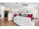 Bright, open living area with wood floors, neutral walls and abundant natural light at 3405 Robust Robin Pl # 3, North Las Vegas, NV 89084