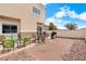 Relaxing patio space with comfortable seating, a grill, and a privacy fence at 3405 Robust Robin Pl # 3, North Las Vegas, NV 89084