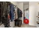 Spacious walk-in closet offering ample storage and organizational features at 3405 Robust Robin Pl # 3, North Las Vegas, NV 89084