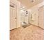 Bathroom featuring a glass-enclosed shower, towel rack and tile flooring at 346 Andy Wheeler Dr, Henderson, NV 89011