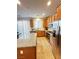 Modern kitchen featuring stainless steel appliances, granite countertops, and ample cabinetry at 346 Andy Wheeler Dr, Henderson, NV 89011