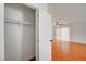Bedroom closet with access to bedroom featuring ceiling fan and window at 4224 Glisan Ct, Las Vegas, NV 89129