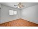 Bedroom featuring light wood-look floors and a window for natural light at 4224 Glisan Ct, Las Vegas, NV 89129