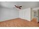 This bright bedroom features wood-look floors and double door closet at 4224 Glisan Ct, Las Vegas, NV 89129