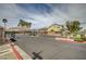 A community entrance with palm trees and landscaping with 'Liberty at Mayfield' signage at 4224 Glisan Ct, Las Vegas, NV 89129