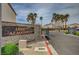 'Liberty at Mayfield' sign in a gated community entrance, with palm trees and greenery at 4224 Glisan Ct, Las Vegas, NV 89129