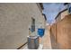 Exterior view of the side of the home, with trash cans at 4224 Glisan Ct, Las Vegas, NV 89129