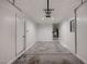 Two car garage with finished walls and an automatic door at 4224 Glisan Ct, Las Vegas, NV 89129