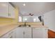 Kitchen featuring white cabinets and an open view to living space at 4224 Glisan Ct, Las Vegas, NV 89129