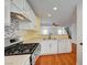 Open kitchen featuring white cabinets, stainless steel appliances, and an open view to living space at 4224 Glisan Ct, Las Vegas, NV 89129