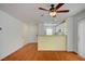 Living room with a clear view to the kitchen, breakfast bar, and entry door at 4224 Glisan Ct, Las Vegas, NV 89129