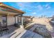 Backyard with a covered patio and a large gravel area at 4363 Del Santos Dr, Las Vegas, NV 89121