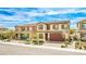 Attractive two-story home featuring a well-maintained front yard and ample parking at 4423 Creekside Cavern Ave, North Las Vegas, NV 89084