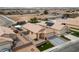 An aerial view of a beautiful home with a private pool, spa, and a desert landscape at 4611 Julesburg Dr, Las Vegas, NV 89139