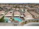 High-angle view of neighborhood showing houses with pools, spas and covered patios at 4611 Julesburg Dr, Las Vegas, NV 89139