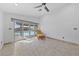 Bright bedroom with a sliding glass door leading to the beautiful outdoor pool area at 4611 Julesburg Dr, Las Vegas, NV 89139