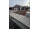 Traditional single-story home featuring a two-car garage and a covered carport at 4868 Treetrunk Ave, Las Vegas, NV 89147