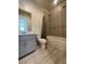 Bathroom featuring vanity, toilet, and tiled shower-tub combination at 492 Pear Lake St, Las Vegas, NV 89138
