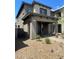 Inviting two-story home featuring a covered porch and low maintenance landscaping at 492 Pear Lake St, Las Vegas, NV 89138