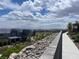 Scenic view of the community, showing multiple homes, landscaping, and mountain views at 492 Pear Lake St, Las Vegas, NV 89138